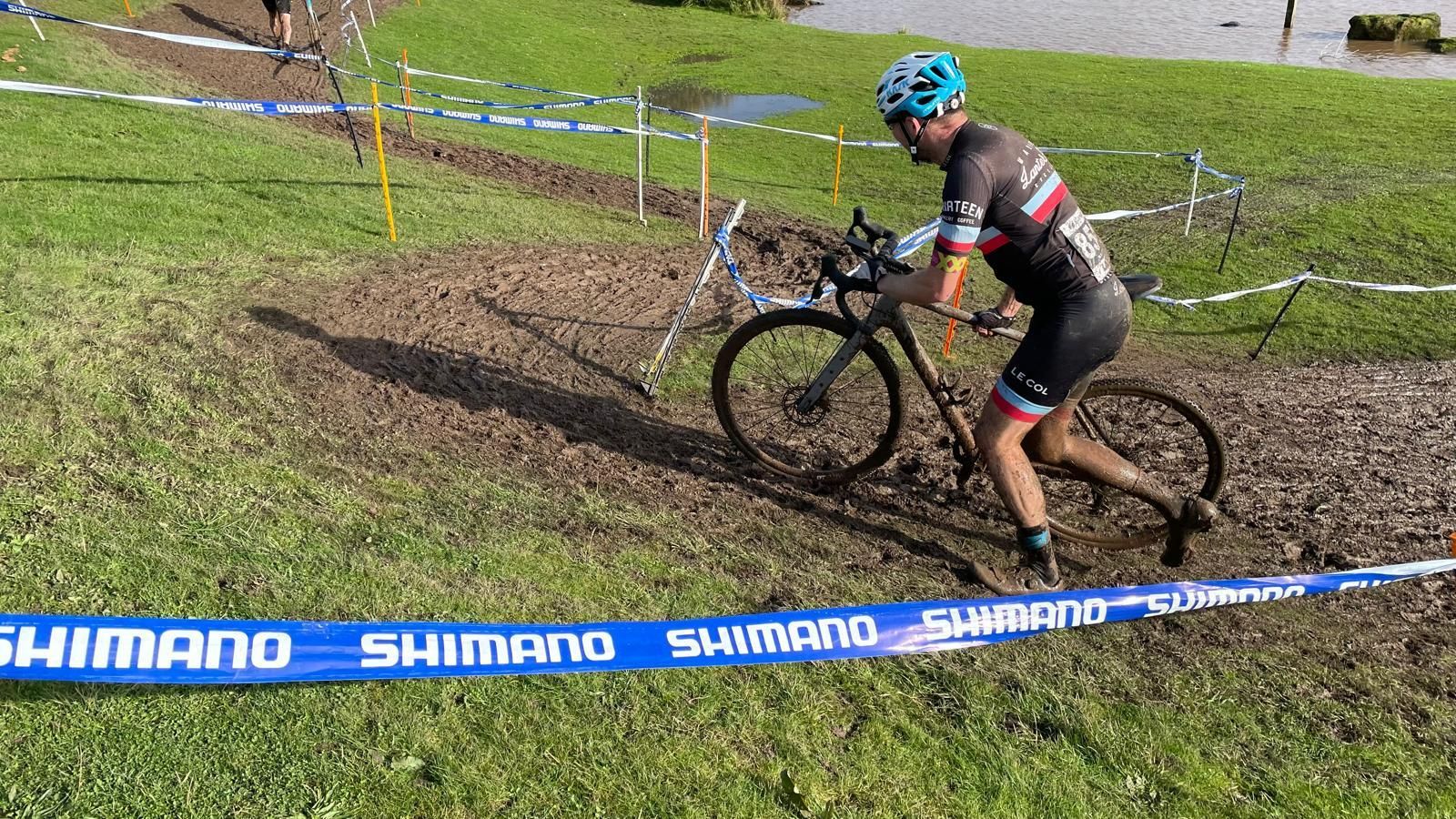 running with the bike on a muddy stretch